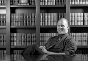 Our obligatory "lawyer in a conference room full of books" picture